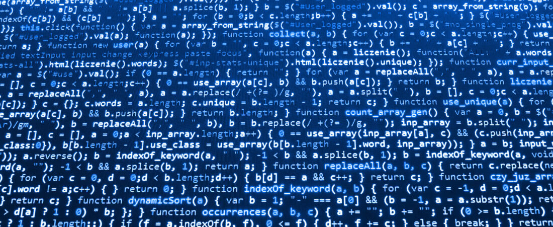 Program source code on blue monitor screen